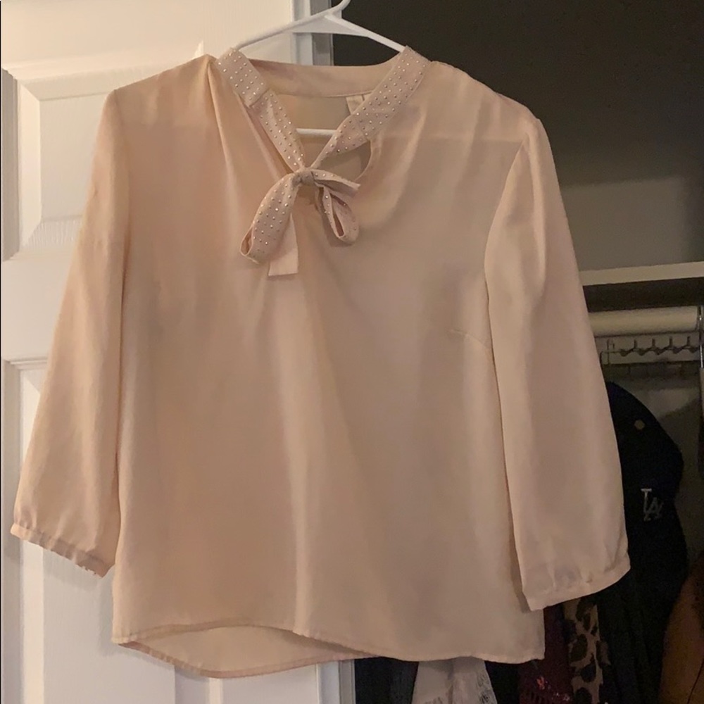 Blush pink blouse with sequin bow neckline